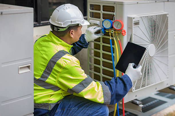 Professional Heat Pump Repair technician working in Hickory Hills, IL